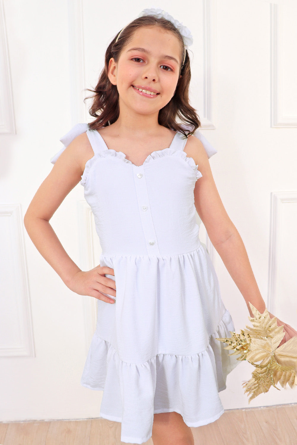 Vestido con elástico multiaguja y faldón dos tiempos con pechera en corpiño